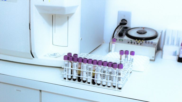 Accelerating Drug Discovery Using Programmable Quantum Simulation